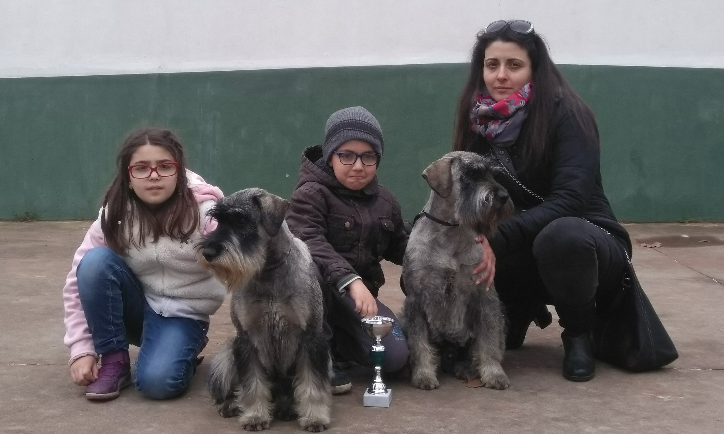 Family photo mother, children and schnauzer